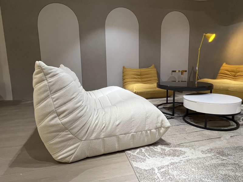 117 beige floor caterpillar sofa in showroom