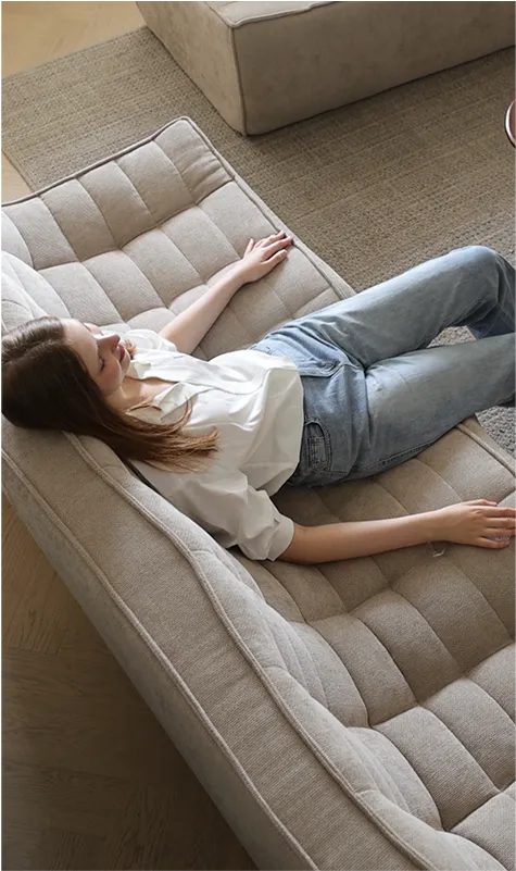 Caterpillar Classic Armless Sofa Lounging Position