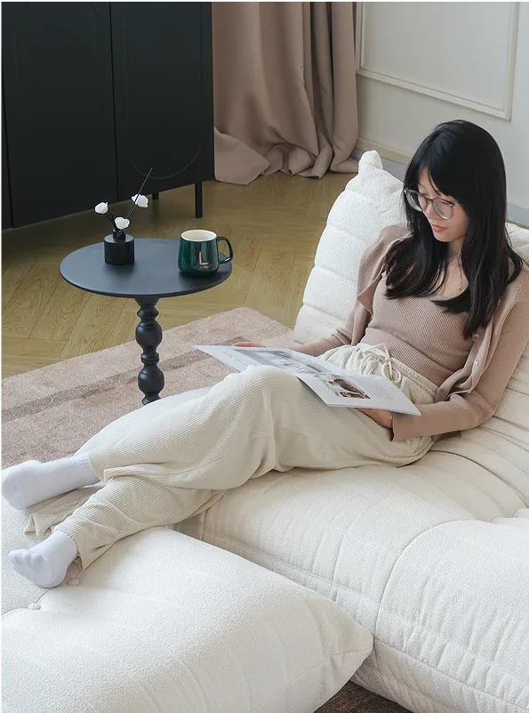 Caterpillar Modern Armless Sofa stretching out position