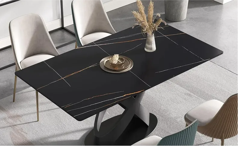 Modern stone dining table in contemporary dining room setting with complementary decor