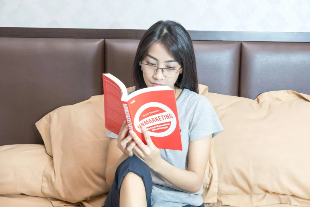 People Read Book On Modular Sofa